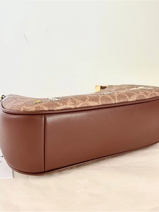 Coach x Peanuts Brown Signature Snoopy Crossbody Bag - Picture 5 of 6